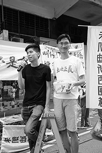 Lester Shum and Chu Hoi-dick addressing participants in the annual pro-democracy march, Hennessy Road, Wanchai, 1 July 2018