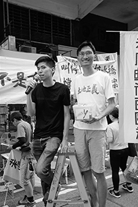 Lester Shum and Chu Hoi-dick addressing participants in the annual pro-democracy march, Hennessy Road, Wanchai, 1 July 2018