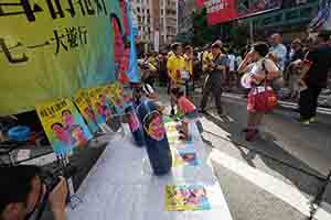Participants in the annual pro-democracy march, Hennessy Road, Wanchai, 1 July 2018