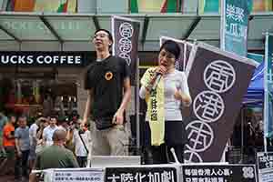 Claudia Mo addressing participants in the annual pro-democracy march, Hennessy Road, Wanchai, 1 July 2018
