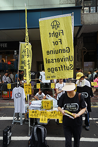 'Shopping movement' supporters at the annual pro-democracy march, Hennessy Road, Wanchai, 1 July 2018