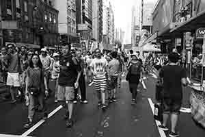 Participants in the annual pro-democracy march, Hennessy Road, Wanchai, 1 July 2018
