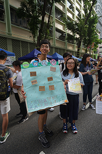 Participants in the annual pro-democracy march, Hennessy Road, Wanchai, 1 July 2018