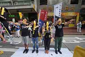 Participants in the annual pro-democracy march, Hennessy Road, Wanchai, 1 July 2018