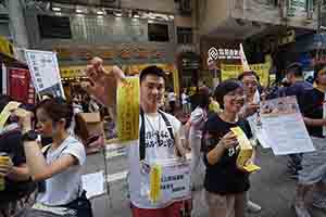 Participants in the annual pro-democracy march, Hennessy Road, Wanchai, 1 July 2018