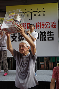 Cardinal Zen collecting donations for the Justice Defence Fund at the annual pro-democracy march, Hennessy Road, Wanchai, 1 July 2018