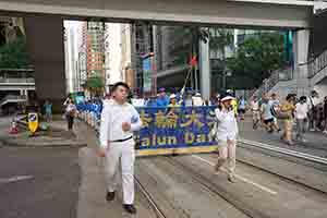 Members of Falun Gong, on the annual pro-democracy march, Queensway, Admiralty, 1 July 2018