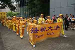 Falun Gong marching band participating in the annual pro-democracy march, Queensway, Admiralty, 1 July 2018
