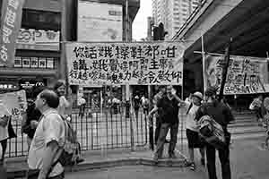 Participants in the annual pro-democracy march, Hennessy Road, Wanchai, 1 July 2018