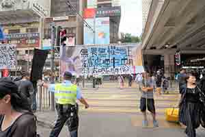 Participants in the annual pro-democracy march, Hennessy Road, Wanchai, 1 July 2018