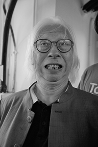 Mok Chiu-yiu at an event of the Hong Kong International Photo Festival, JCCAC, Shek Kip Mei, 25 October 2018