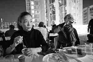 Sonia Au and Gerard Henry at a meal on the roof of the JCCAC following a Hong Kong International Photo Festival exhibition opening, Shek Kip Mei, 25 October 2018