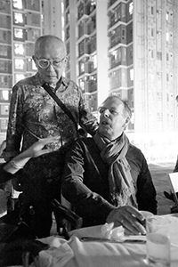 Leong Ka Tai and Gerard Henry at a meal on the roof of the JCCAC following a Hong Kong International Photo Festival exhibition opening, Shek Kip Mei, 25 October 2018