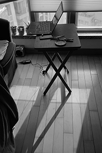 Laptop computer on a desk in a living room, Sheung Wan, 2 October 2018