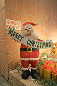 Santa Claus decoration in front of a residential building, Sheung Wan, 11 December 2018