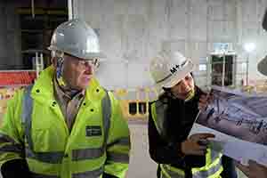 Duncan Pescod, Director of the West Kowloon Cultural District Authority, and Suhanya Raffel, museum director, in the M+ building under construction, West Kowloon, 14 December 2018