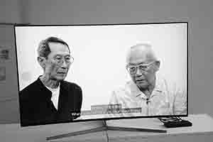 Joseph Fung and Leong Ka Tai in a video clip at Fung’s retrospective exhibition, Pao Galleries, Hong Kong Arts Centre, 15 December 2018