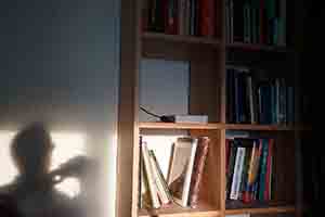 Shadow and bookshelf, Sheung Wan, 9 January 2019