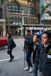 Police with a video camera at a New Year's Day protest march, Hennessy Road, Wanchai, 1 January 2019