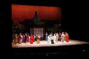 Performers taking their bows with artistic director Pak Suet-sin after the opening performance of 'The Reincarnation of Red Plum', Xiqu Centre, West Kowloon Cultural District, 20 January 2019