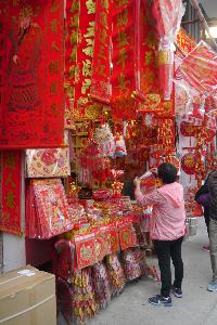 Items related to the Lunar New Year on sale in a specialist shop, Queen's Road West, Sai Ying Pun, 28 January 2019