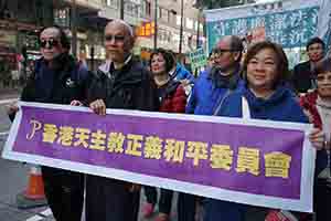 Catholics participating in the New Year's Day protest march, Hennessy Road, Wanchai, 1 January 2019