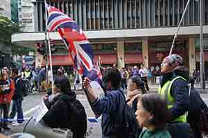 Protester with British flag, Hennessy Road, Wanchai, 1 January 2019