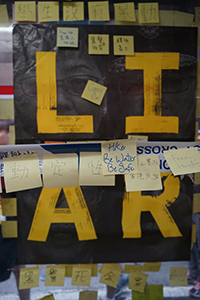 Stickers and posters on a tram stop, march from Causeway Bay to Central, Wanchai, 21 July 2019