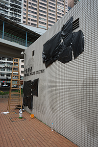 Black plastic bags covering graffiti on the Central Police Station, Sheung Wan, 22 July 2019