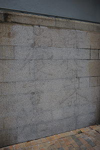 Traces of erased protest graffiti on the wall of Western Police Station, Des Voeux Road West, Sai Ying Pun, 26 July 2019