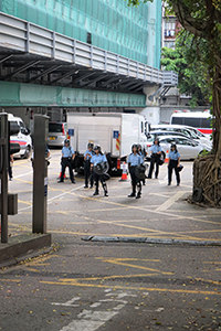 Police inside Western Police Station, Sai Ying Pun, 28 July 2019