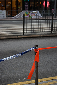 Tape replacing railings that have been removed by protesters, Des Voeux Road West, Sai Ying Pun, 30 July 2019