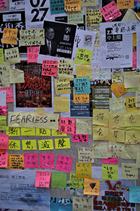 Stickers and posters on a pillar, outside HKU MTR station, Hill Road, Shek Tong Tsui, 30 July 2019