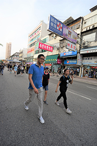 Lam Cheuk-ting observing the 'Reclaim Sheung Shui' protest against parallel traders from China, San Fung Avenue, 13 July 2019