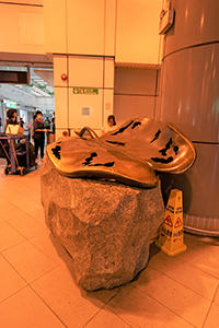 Sculpture by Mok Yat-san outside Tai Po Market MTR station, 13 July 2019