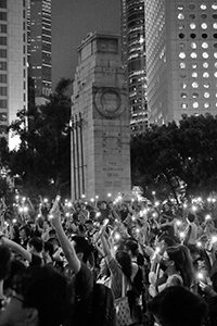 Protesters holding up their phones with the light turned on, civil servant rally, Jackson Road, Central, 2 August 2019