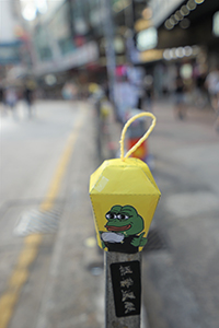 Origami with Pepe the Frog printed on it, Hennessy Road, Causeway Bay, 15 September 2019