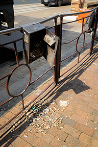 Cigarette butts that have fallen on the pavement, Des Voeux Road West, Sheung Wan, 16 September 2019