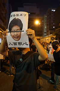 Protester with sign, outside Queen Elizabeth Stadium, Wanchai, 26 September 2019