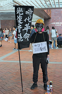 Protester with a sign, University of Hong Kong, Pokfulam, 2 September 2019