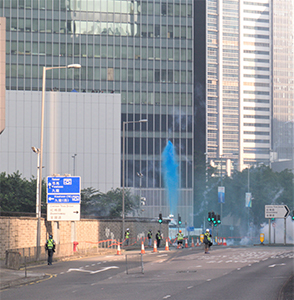 Water cannon firing water laced with blue dye, Harcourt Road, Admiralty, 1 October 2019