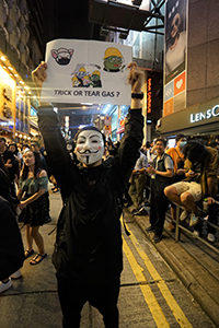 Protesting Halloween reveller, Wellington Street, Central, 31 October 2019