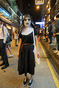 Person in Halloween costume, Wellington Street, Central, 31 October 2019