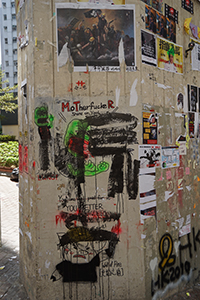 Posters and graffiti on a pillar, Hill Road, Shek Tong Tsui, Hong Kong Island, 3 October 2019