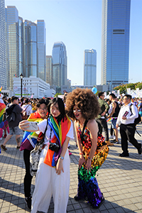 Participants taking selfies at a gay pride rally, Edinburgh Place, Central, 16 November 2019