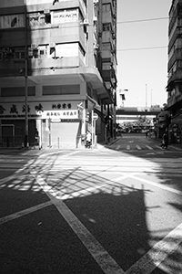 Light and shadow on Des Voeux Road West, Sheung Wan, 17 November 2019