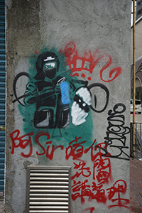 Graffiti on the wall of a Bank of China branch, Nathan Road, Kowloon, 19 November 2019