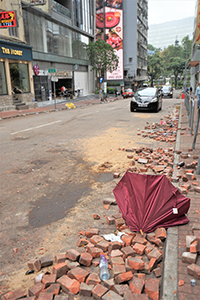 Aftermath of overnight street battles between police and protesters, Observatory Road, Tsim Sha Tsui, 19 November 2019