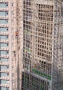 Removing scaffolding from a building under construction, Ko Shing Street, Sheung Wan, 24 December 2019