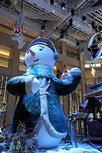 A snowman in a Christmas installation in the atrium of The Landmark, Central, 20 December 2019